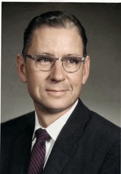 Restored and colorized (AI-assisted); faces are the original photo, colours are a best guess. Horace Glenn Coffman, portrait, mid-century.