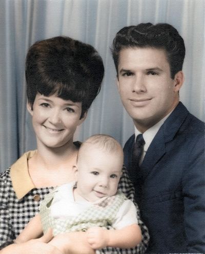 Restored and colorized (AI-assisted); colours are a best guess. Nancy and Bill Proeger with their infant son Earl, c. 1967.