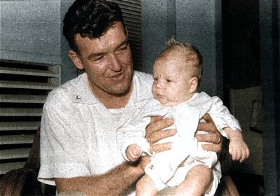 Restored and colorized (AI-assisted); faces are the original photo, colours are a best guess. Earl T. Roberts — c. 1955.